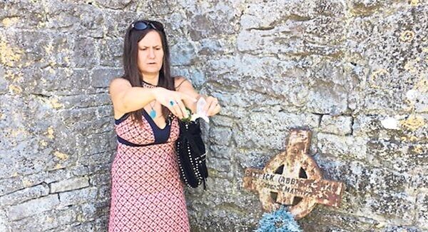 Maggie McCourt scattering his ashes at Mungret Abbey. Maggie McCourt scattering his ashes at Mungret Abbey.