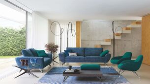 <p>Caractere three-seater in sugar-bag blue by Roche Bobois.</p>