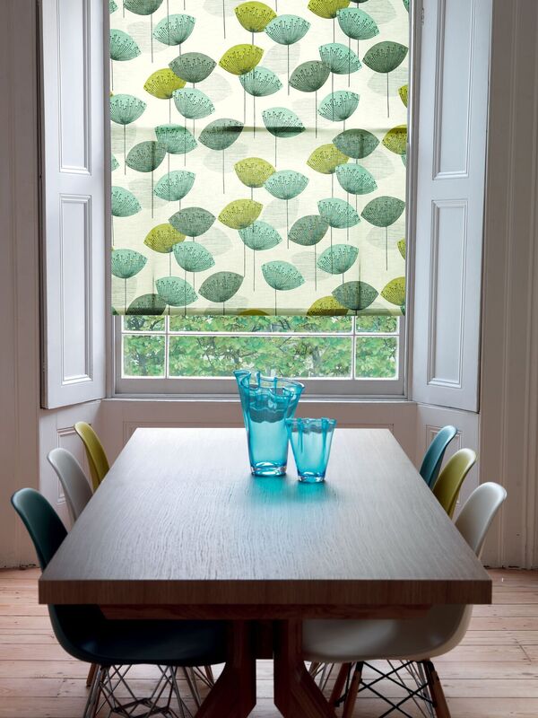 Here a dining room enjoys the soft glow of light-filtering roller blinds in Sanderson's fabric dandelion clock. From €50 a metre in a cotton blend, multiple suppliers. Here a dining room enjoys the soft glow of light-filtering roller blinds in Sanderson's fabric dandelion clock. From €50 a metre in a cotton blend, multiple suppliers.
