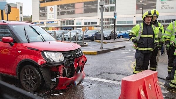 Emergency services at the scene in Blackpool where the car crashed shortly after it had hit Carmel Ring’s car. Picture: Damian Coleman