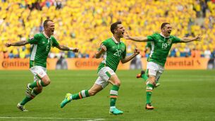 <p>QUIDS IN: Wes Hoolahan, centre, of Republic of Ireland celebrates after he scored his side's first goal during the UEFA Euro 2016 Group E match between Republic of Ireland and Sweden at Stade de France in Saint Denis, Paris, France. Pic: Stephen McCarthy/Sportsfile</p>