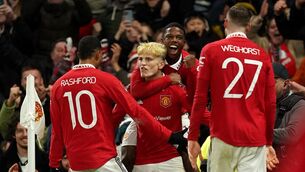 <p>RIGHT ON TIME: Manchester United's Alejandro Garnacho (front) celebrates with team-mates Marcus Rashford and Tyrell Malacia after scoring their side's second goal of the game during the Emirates FA Cup fifth round match at Old Trafford, Manchester. Pic: PA Wire</p>