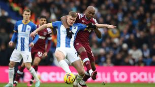 <p>STRENGTH: Evan Ferguson of Brighton &amp; Hove Albion is put under pressure by Angelo Ogbonna of West Ham United. Pic: Steve Bardens/Getty Images</p>