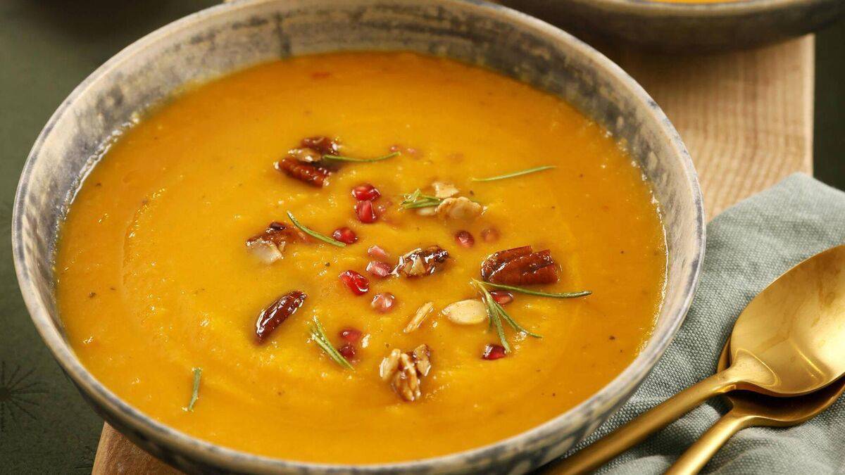Spicy sweet potato soup with maple almonds and pecans 