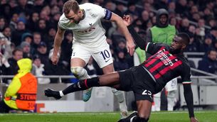 <p>HURDLING HARRY: Tottenham Hotspur's Harry Kane and AC Milan's Fikayo Tomori (right) battle for the ball during the Champions League round of sixteen, second leg match at the Tottenham Hotspur Stadium on Wednesday night. Picture: John Walton/PA Wire.</p>