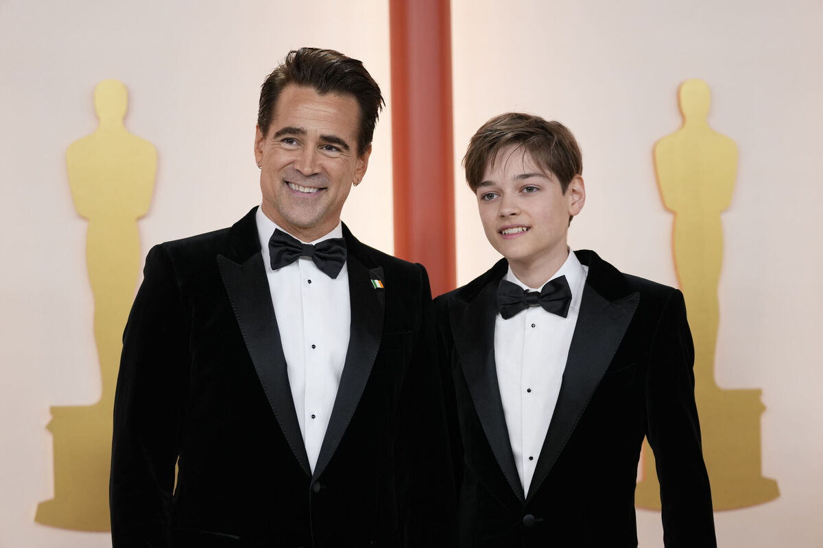 Colin Farrell, left, and his son Henry Tadeusz. Picture: AP Photo/Ashley Landis