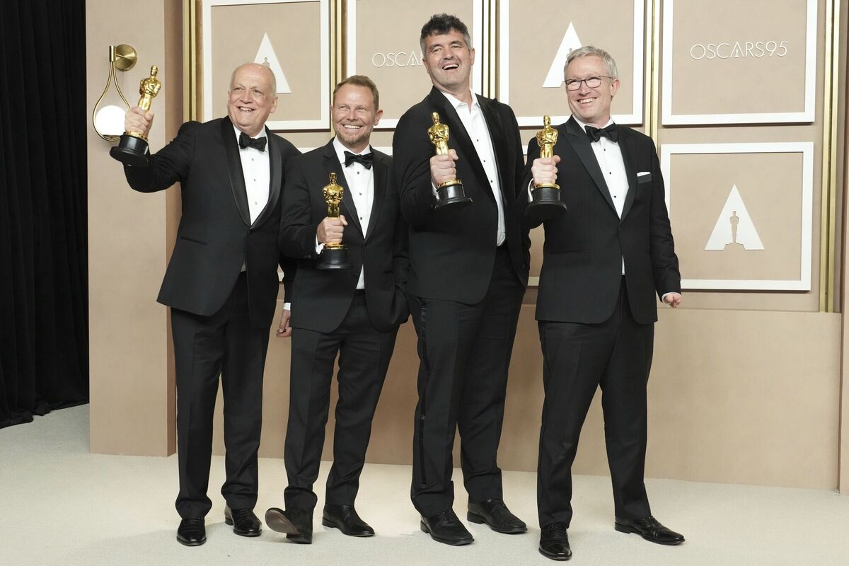 Joe Letteri, from left, Richard Baneham, Eric Saindon and Daniel Barrett, winners of the award for best visual effects for Avatar: The Way of Water. Picture: Jordan Strauss/Invision/AP