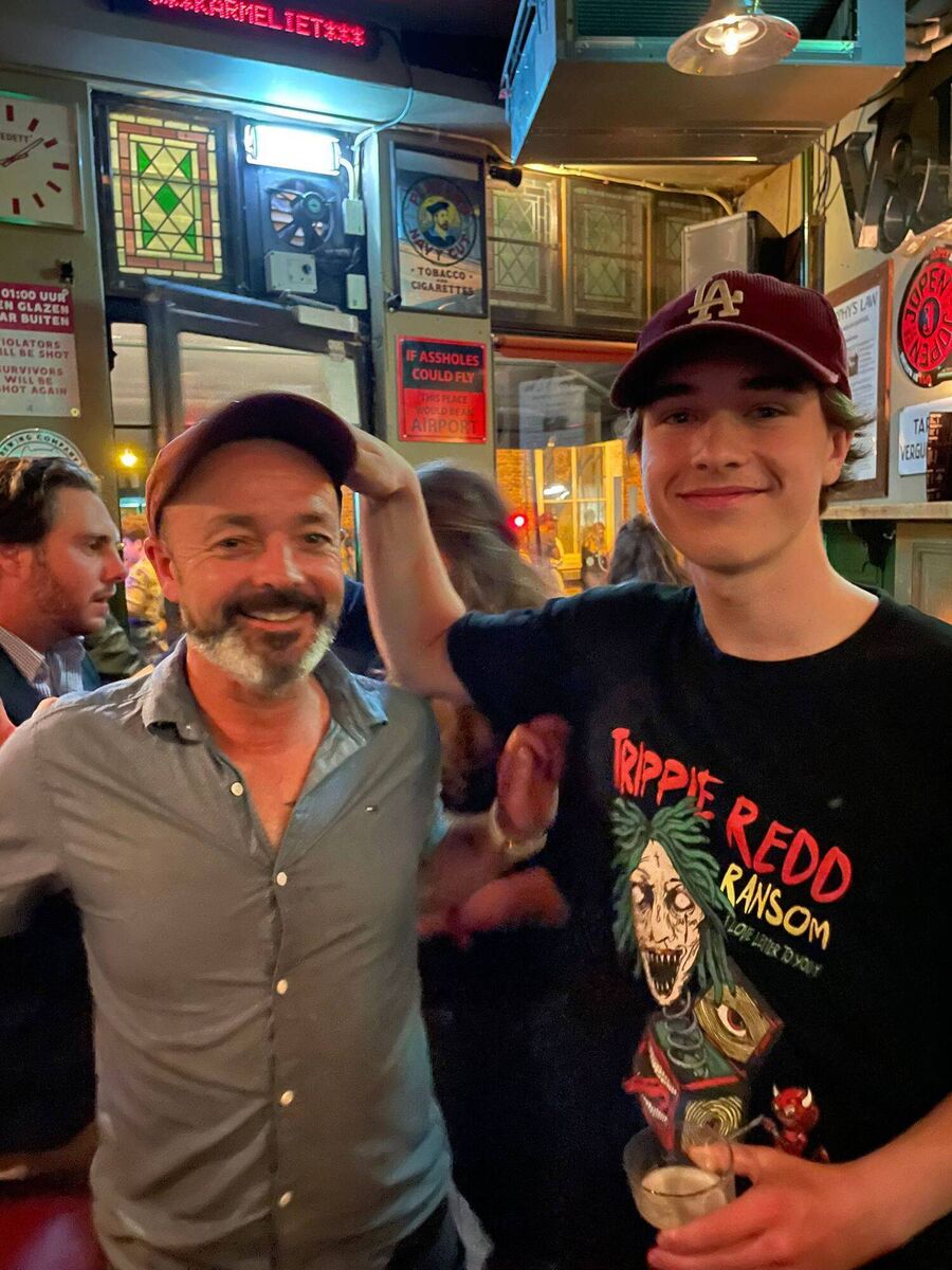 Paul Tierney with his son Raphael in their bar in Haarlem, The Netherlands.