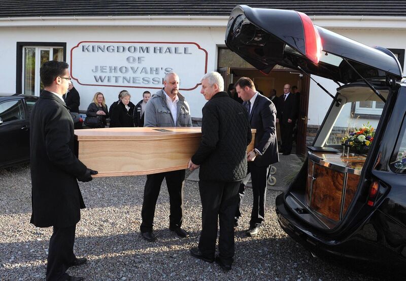 Members of Kerry Autism Action carry the coffin of Susan Dunne at her funeral at the Kingdom Hall of Jehovah's Witnesses, Tralee, in 2013.  File picture