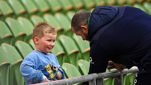 <p>GRANDAD'S BOY: Head coach Andy Farrell, with his grandson Tommy, during the Ireland rugby captain's run at the Aviva Stadium in Dublin. Pic: Ramsey Cardy/Sportsfile</p>