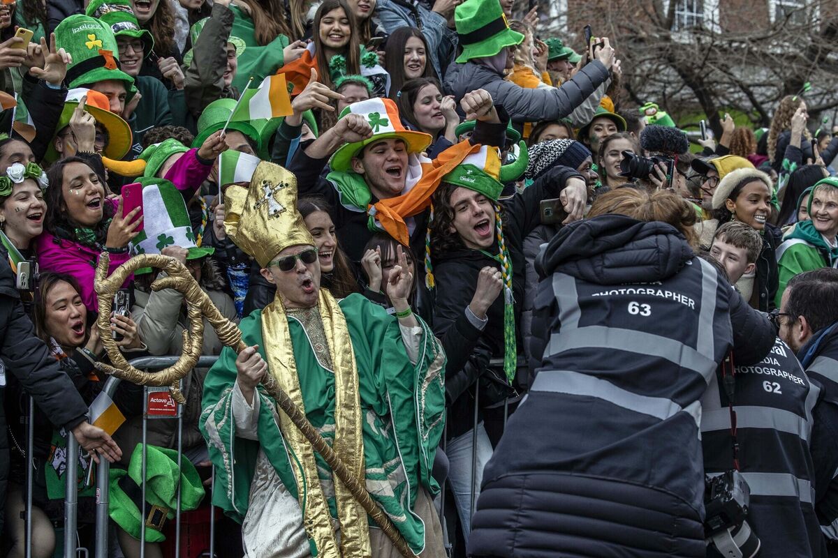 St Patrick poses for photos in front of the crowds in Dublin. Picture: Clare Keogh