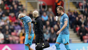 Tottenham forward Richarlison leaves the field of play after only five minutes after he picked up an injury (Andrew Matthews/PA)