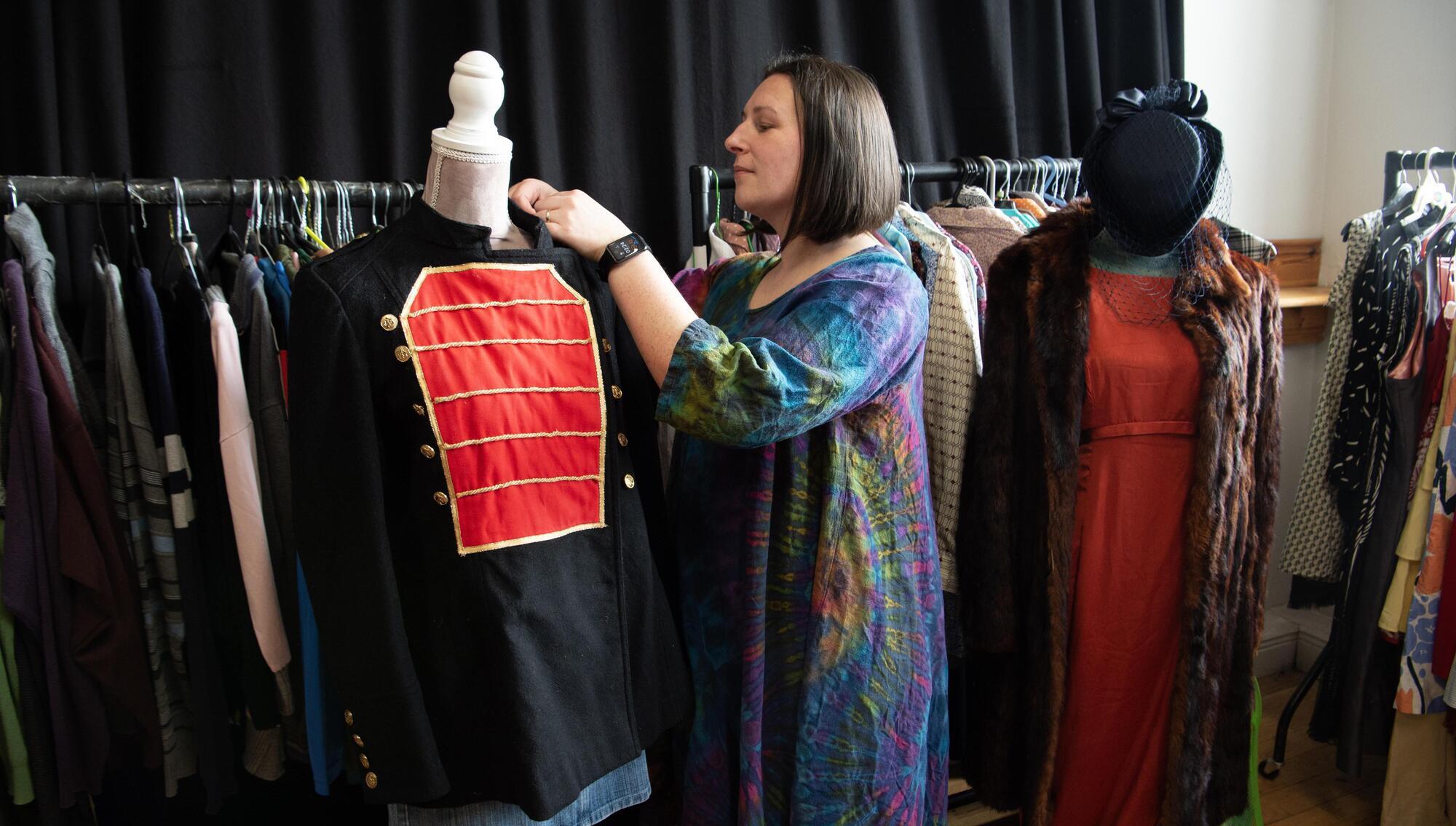 Naomi Daly with a military uniform worn in the romantic opera Der Vampyr. These vintage stage costumes will go up for public auction at the Everyman Palace Theatre, Cork on March 24 and 25. Pic: Dan Linehan