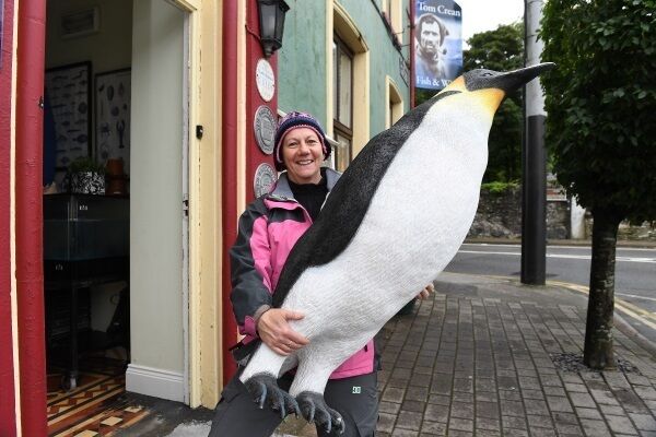 Aileen Crean with a life-size replica emperor penguin at the Tom Crean Fish and Wine Restaurant, Kenmare. Picture: Domnick Walsh