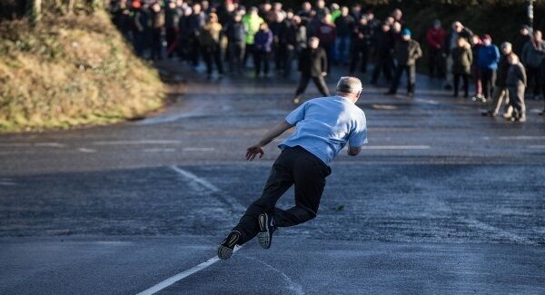Jim Coffey in action at a road bowling final in Brinny, Co. Cork last month. Pic: Cathal Noonan
