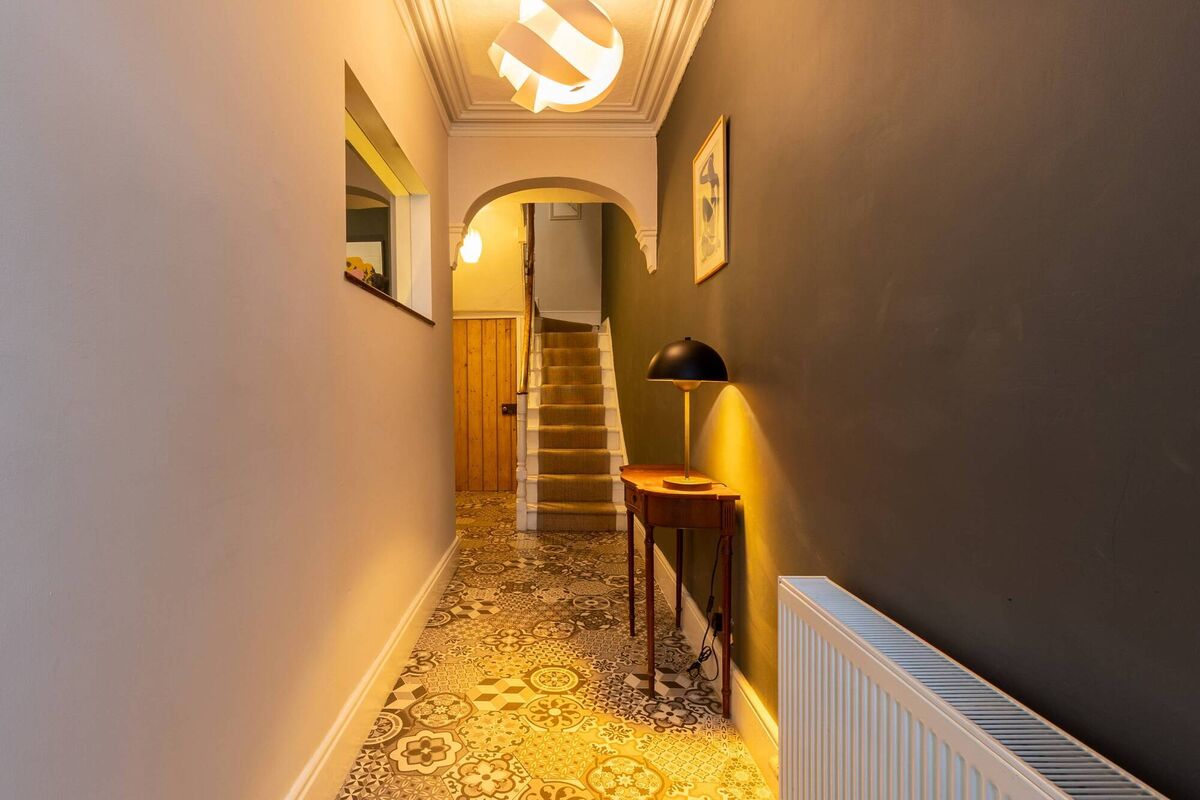Hall with sisal-shod stairs Hall with sisal-shod stairs