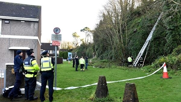 Members of the Cork Fire Service and the Gardaí taking part in a massive search of the undergrowth on the cliff face above O’Donovan Rossa Road. Picture: Dan Linehan