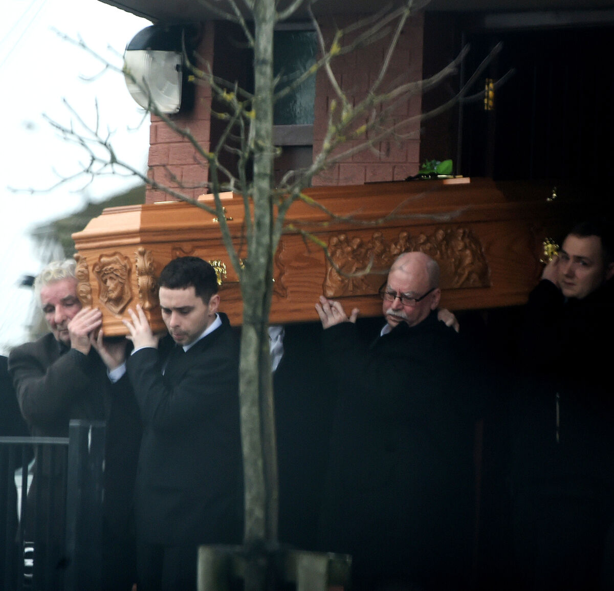 The remains of Francis (Frankie) Dunne are shouldered from the church of St Mary's on The Hill, Knocknaheeney, Cork. The remains of Francis (Frankie) Dunne are shouldered from the church of St Mary's on The Hill, Knocknaheeney, Cork.