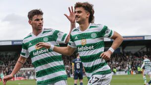 <p>OPENER: Celtic's Jota celebrates his teams first goal with Matt Riley during the cinch Premiership match at the Global Energy Stadium, Dingwall. Pic: Steve Welsh/PA Wire</p>