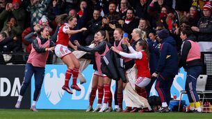 <p>JUMPING FOR JOY: Katie McCabe of Arsenal celebrates with teammates after scoring winning goal during the FA Women's Super League match against Manchester City at Meadow Park. Pic: Marc Atkins/Getty Images</p>