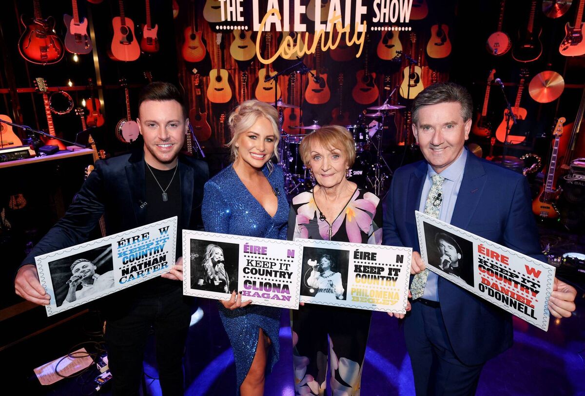 Nathan Carter, Cliona O'Hagan, Philomena Begley and Daniel O'Donnell with their stamps. Picture: Maxwells Nathan Carter, Cliona O'Hagan, Philomena Begley and Daniel O'Donnell with their stamps. Picture: Maxwells