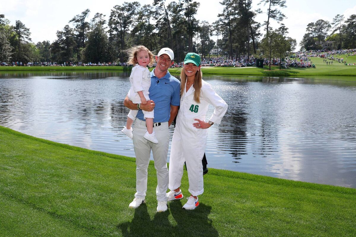 Rory McIlroy poses for a photo with his wife, Erica Stoll and daughter Poppy McIlroy during the Par 3 contest prior to the 2023 Masters Tournament at Augusta National Golf Club. Picture: Andrew Redington/Getty Images