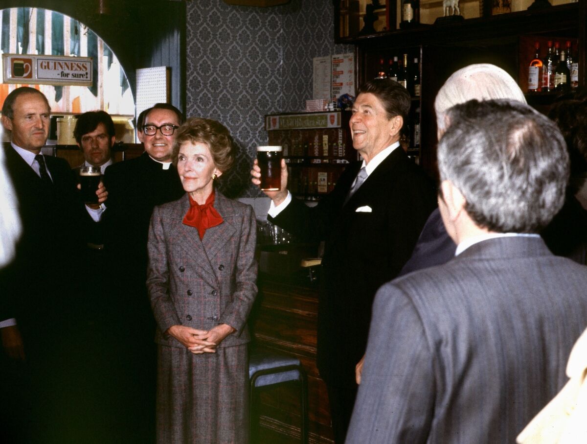 Ronald Reagan enjoying a pint of Smithwick's in Ballyporeen, Co Tipperary in June 1984. His wife Nancy Reagan's choice of tipple was a glass of Carolans Irish Cream Liqueur which is made in Clonmel. Picture: Irish Examiner Archive