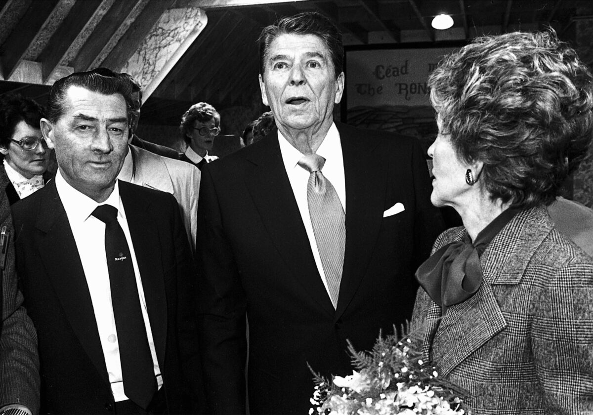 Myles O'Regan from Buttevant Co Cork meeting his lookalike, US president Ronald Reagan, and Nancy Reagan in Ballyporeen in June 1984. Reagan later wrote of his shock at how similar to him Mr O'Regan was. File picture: Irish Examiner Archive 