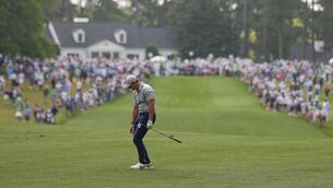 <p>MISERY AT THE MASTERS: Rory McIlroy, of Northern Ireland, reacts to his shot on the first hole. Pic: AP Photo/Matt Slocum</p>