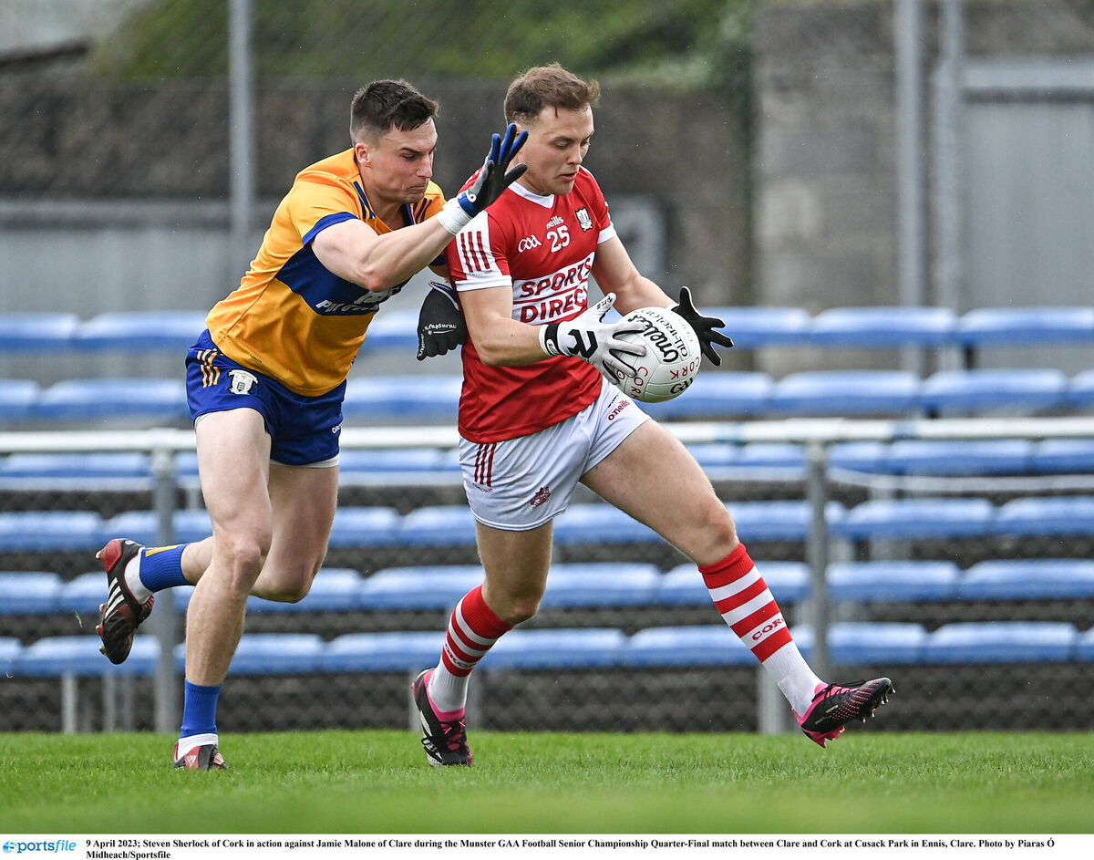 Steven Sherlock of Cork in action against Jamie Malone of Clare. Pic: Piaras Ó Mídheach/Sportsfile Steven Sherlock of Cork in action against Jamie Malone of Clare. Pic: Piaras Ó Mídheach/Sportsfile