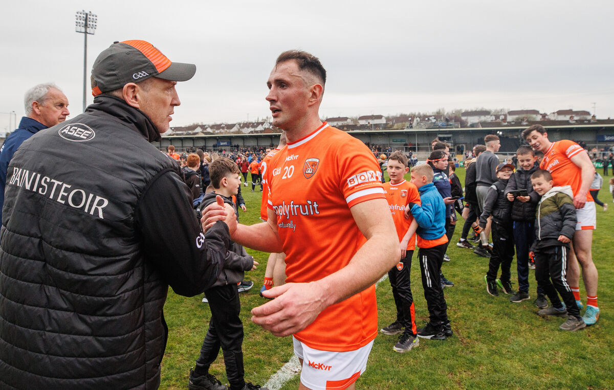 DOING ENOUGH? Armagh’s manager Kieran McGeeney and Stephen Sheridan celebrate. Pic: ©INPHO/James Crombie