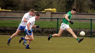<p>RACING INTO THE SEMIS: Emmett Rigter, Limerick controlling the ball against Ronan O'Connell and Michael O'Brien, Waterford in the Munster U20 Football Quarter Final in Ballagran</p>