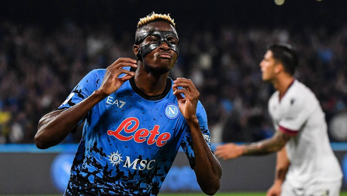 Napoli's Nigerian forward Victor Osimhen celebrates after scoring his side's third goal against Bologna.Pic:TIZIANA FABI/AFP via Getty Images)