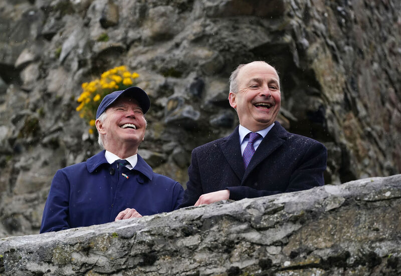US President Joe Biden (left) with Tanaiste Micheal Martin at Carlingford Castle, Co Louth, during his trip to the island of Ireland. Picture date:Picture: Brian Lawless/PA Wire