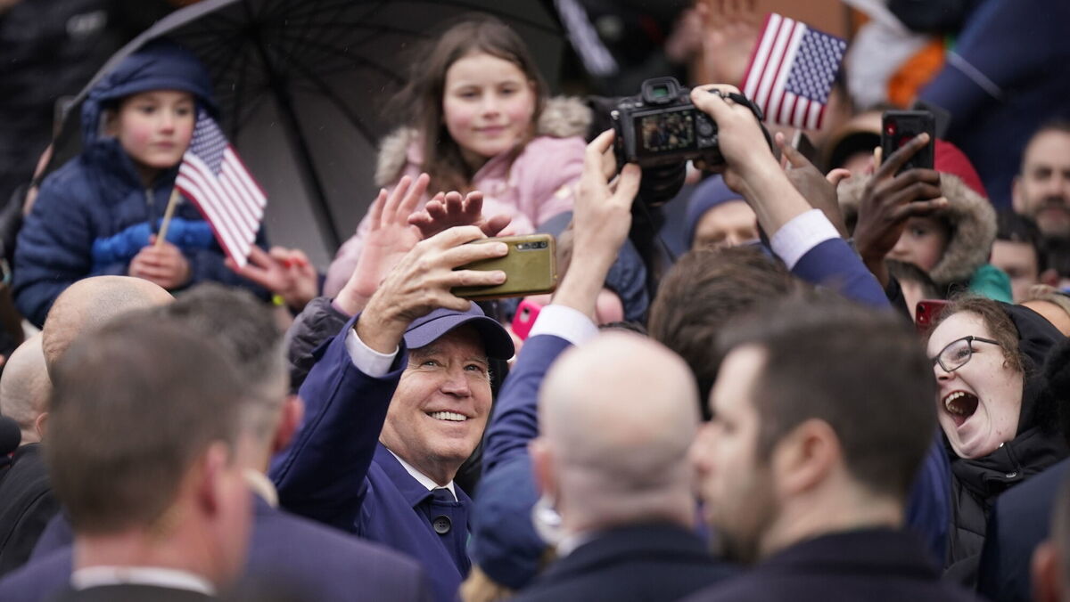 US President Joe Biden takes a selfie while on a walkabout through Dundalk,. Picture: Niall Carson/PA Wire US President Joe Biden takes a selfie while on a walkabout through Dundalk,. Picture: Niall Carson/PA Wire