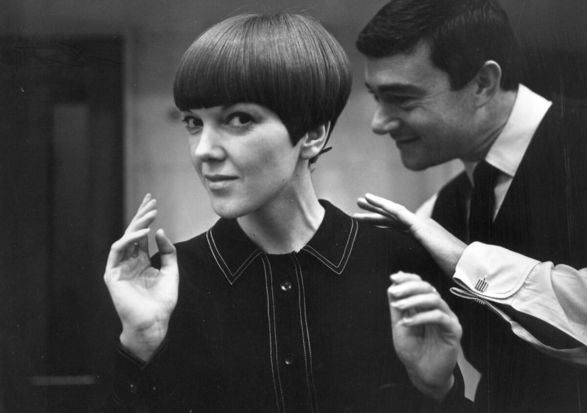 Clothes designer Mary Quant,  having her hair cut by another fashion icon, hairdresser Vidal Sassoon in November  1964. Picture: Ronald Dumont/Daily Express/Hulton Archive/Getty Images