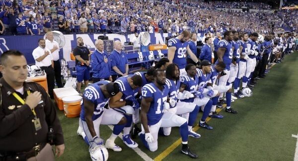 Indianapolis Colts take a knee.