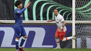 <p>DUCK BROKEN: Danny Ings (right) celebrates after scoring West Ham’s goal away to Gent. Pic: Geert Vanden Wijngaert/AP</p>