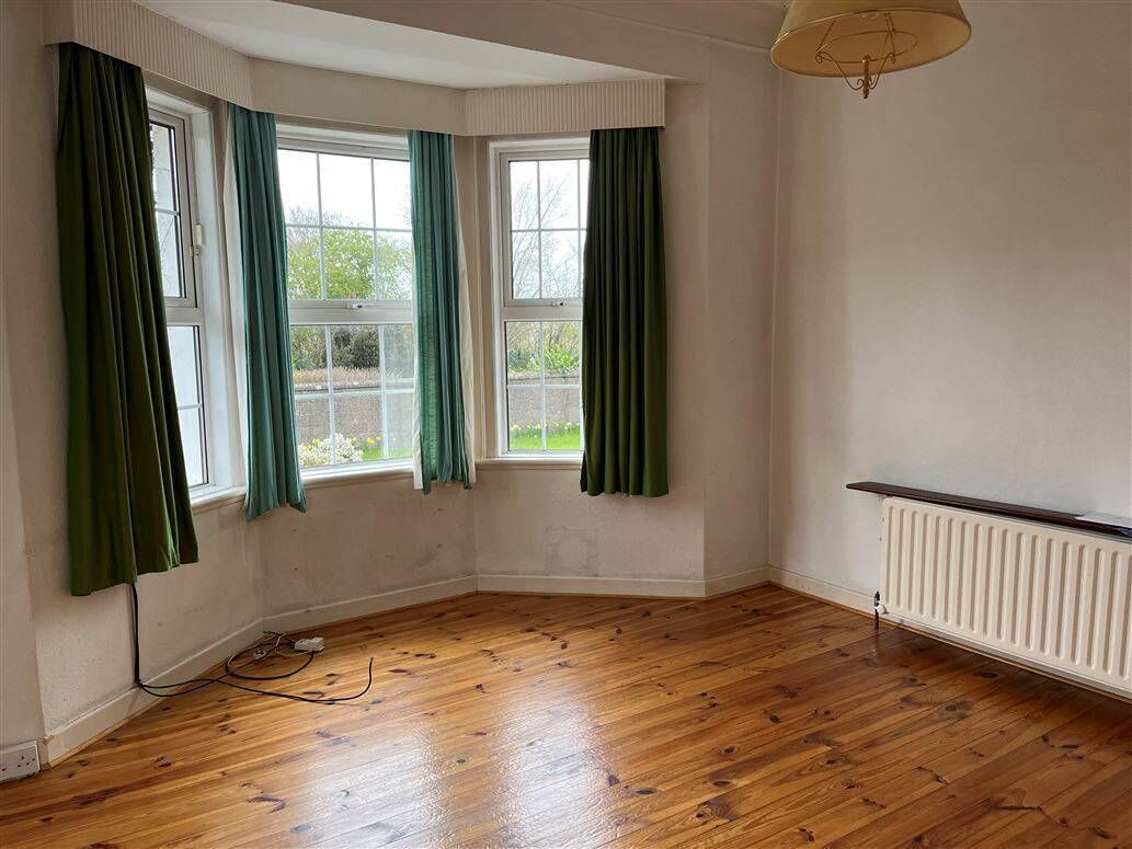 Bay window in a reception room in the four-bed home