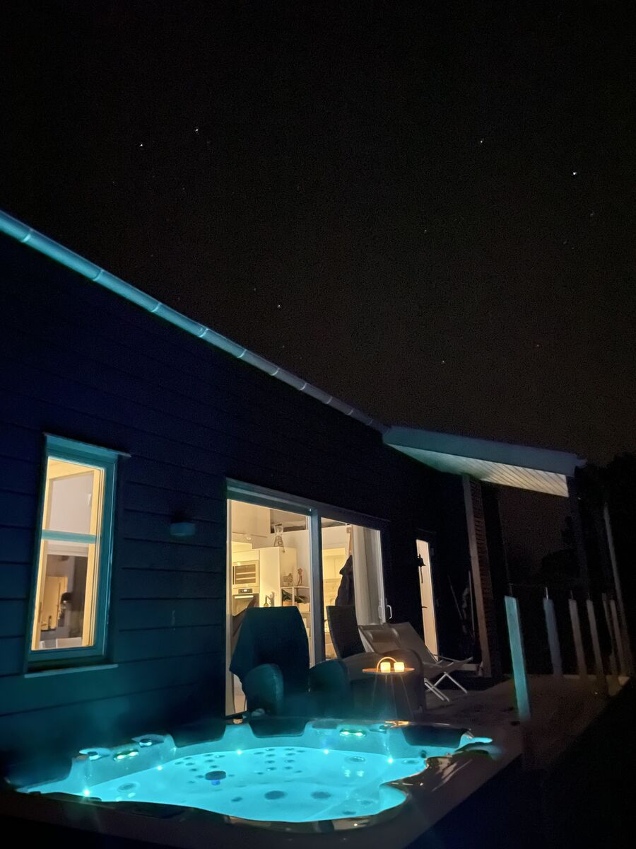 A hot-tub under a starry sky