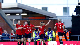 <p>Manchester United’s Rachel Williams (left) celebrates her winner (Will Matthews/PA).</p>