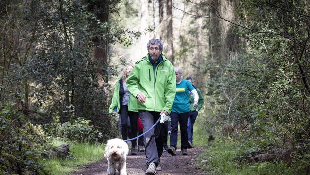 <p>Charlie Bird leading the 5km Charlie Bird Hand of Friendship Walk with Samaritans in Avondale Forest Park, Co Wicklow. Picture: Fergal Phillips</p>