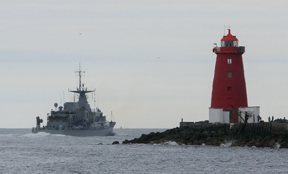 Irish Naval Ship LE William Butler Yeats passes Poolbeg lighthouse in  Dublin and returns to routine security operations at sea. Picture: Gareth Chaney/Collins