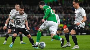 <p>TRICKY CUSTOMER: Mikey Johnston of Republic of Ireland in action against Roberts Savalnieks and Alvis Jaunzems of Latvia during the international friendly at the Aviva Stadium. Pic: Seb Daly/Sportsfile</p>