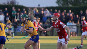 <p>PASSAGE SECURED: Jamie Moylan, Clare, clearing the sliotar against Zack Biggane, Cork in the Munster Minor Hurling Match in Sixmilebridge. Pic: Brendan Gleeson</p>