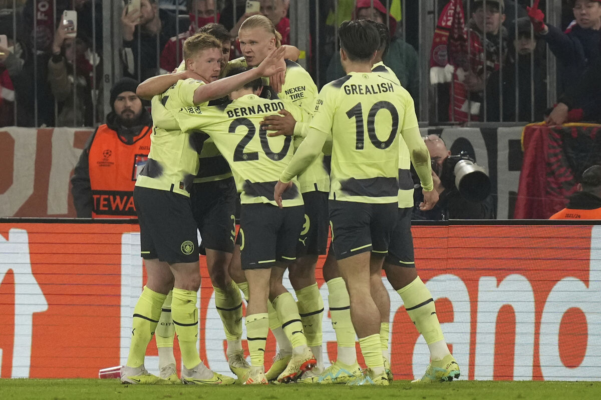 Manchester City's Erling Haaland, centre, celebrates after scoring his side's opening goal during the Champions League quarter final second leg soccer match between Bayern Munich and Manchester City, at the Allianz Arena stadium in Munich, Germany, Wednesday, April 19, 2023. (AP Photo/Matthias Schrader) Manchester City's Erling Haaland, centre, celebrates after scoring his side's opening goal during the Champions League quarter final second leg soccer match between Bayern Munich and Manchester City, at the Allianz Arena stadium in Munich, Germany, Wednesday, April 19, 2023. (AP Photo/Matthias Schrader)
