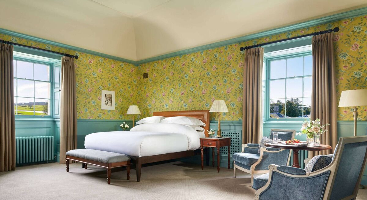 Bedroom in The Summer Suite: The wallpaper in Carton House was conserved and matched by David Skinner. 