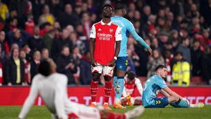 <p>STILL STANDING: Arsenal's Bukayo Saka reacts after the Premier League match at the Emirates Stadium. Pic: John Walton/PA Wire.</p>