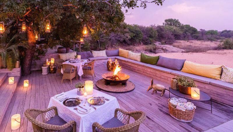 Sunset safari dining at Thornybush Game Lodge, South Africa. 