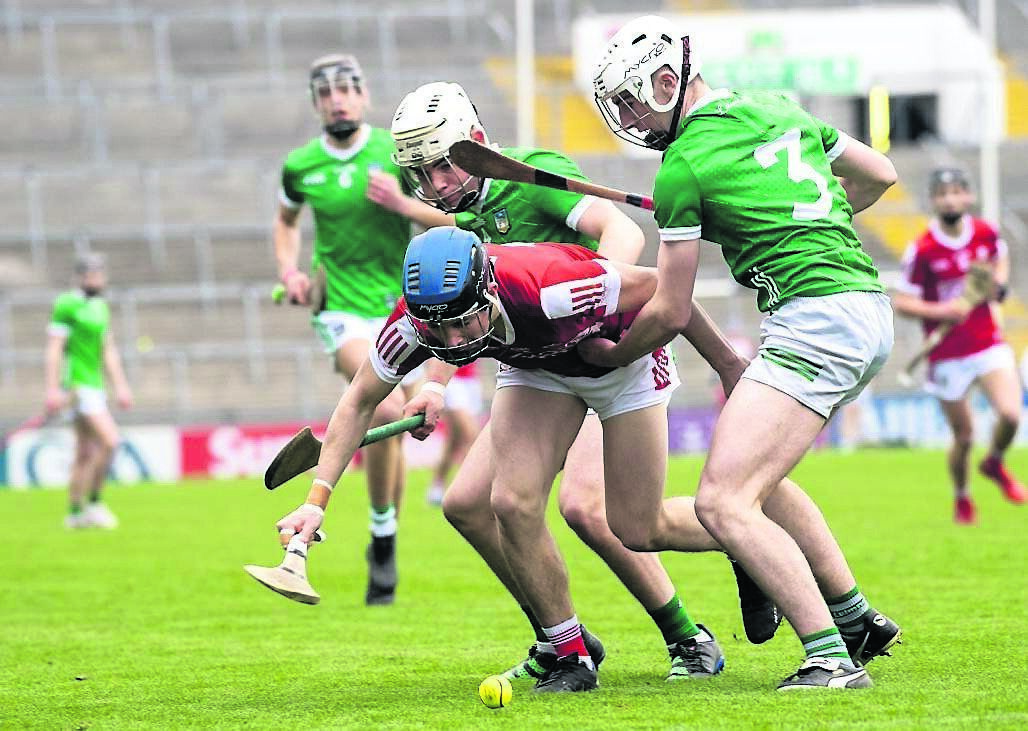 Barry O'Fynn of Cork breaking between Limerick players Sean Morrissey and Conor Bickford during their Electric Ireland Munster Minor Hurling Championship match at the TUS Gaelic Grounds, Limerick. Picture: Dan Linehan Barry O'Fynn of Cork breaking between Limerick players Sean Morrissey and Conor Bickford during their Electric Ireland Munster Minor Hurling Championship match at the TUS Gaelic Grounds, Limerick. Picture: Dan Linehan